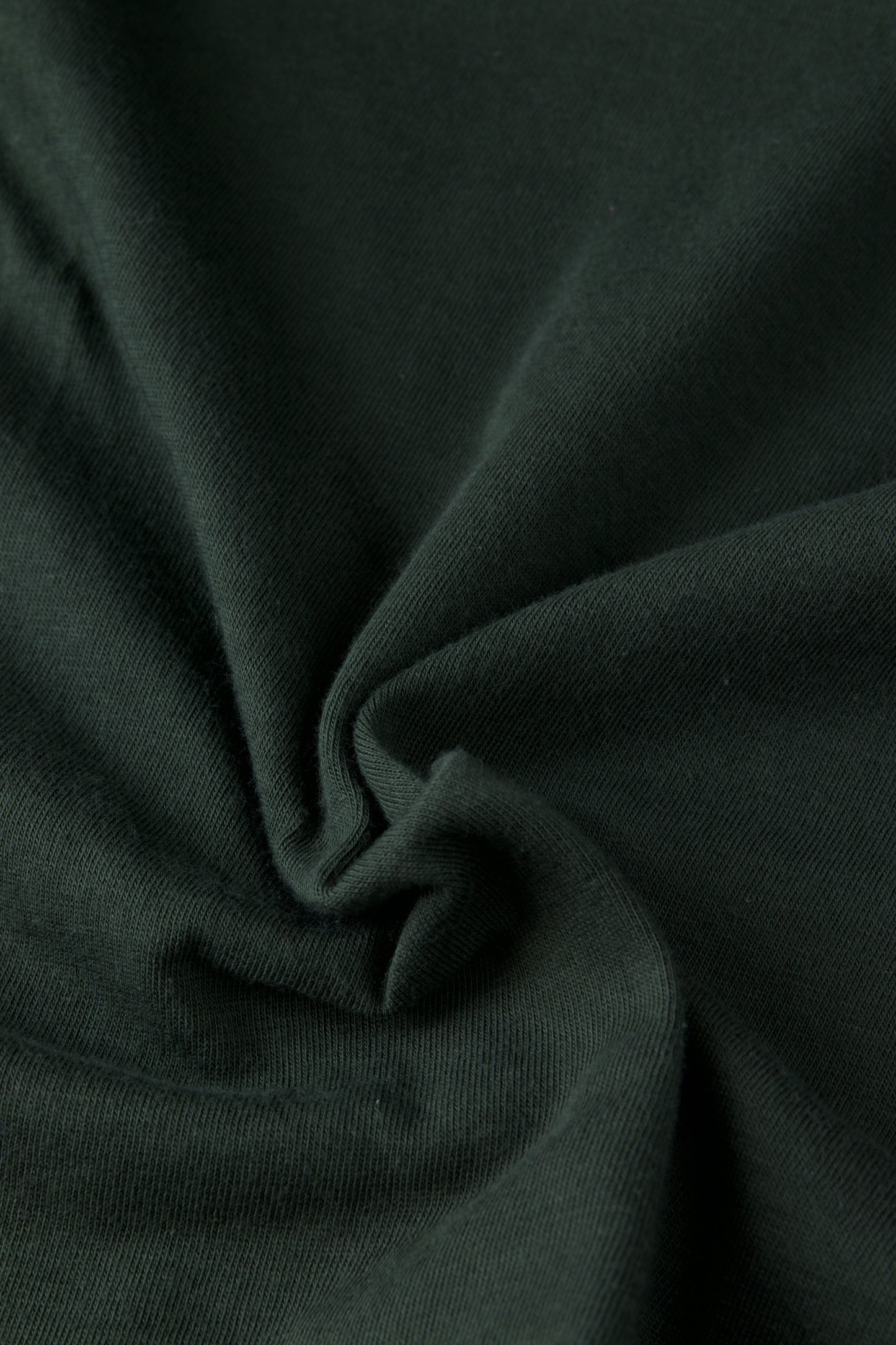tissu originaux au mètre pour couture de t-shirt. jersey 100% coton vert kaki foncé uni. disponible en quantité limité sur la mercerie en ligne Muremure
