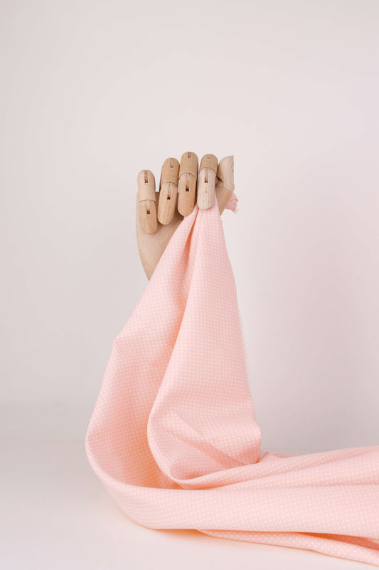 Popeline de viscose rose pêche à pois blancs